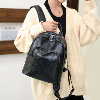 Mochila de viaje de cuero PU unisex para niñas a prueba de agua y respetuosa con el medio ambiente
